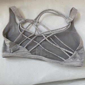 Gray and white woman’s bra Lululemon size 8